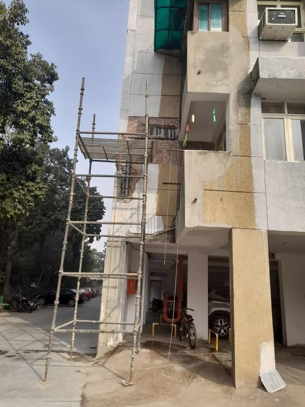 Superficial pillar strengthening work at SAIL CGHS Ltd. (Green Heavens Apartments) reported by residents.