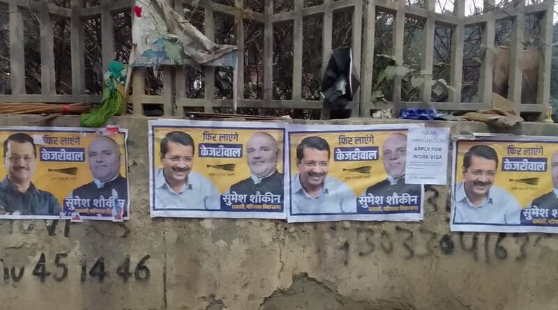 Political outfits defacing public property by pasting their posters on walls before the Delhi Assembly Election 2025. Photo: Rakesh Raman / RMN News Service