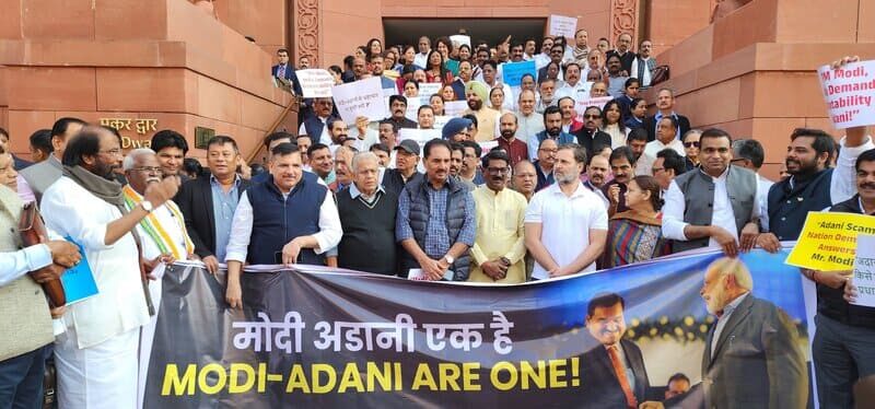 Members of Parliament (MPs) from opposition parties raising slogans on December 3, 2024 in the Parliament of India premises against prime minister (PM) Narendra Modi and his alleged collusion with accused oligarch Gautam Adani. Photo courtesy: Aam Aadmi Party (AAP)