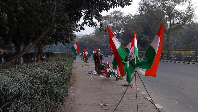 People Selling India Flags on a Road in New Delhi. Photo: Rakesh Raman / RMN News Service